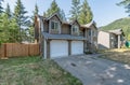 Large family home two car garage to Bay split level forest green real estate Royalty Free Stock Photo