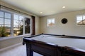 Large Family Room With Pool Table And Tv.