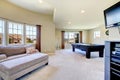 Large family room with pool table and tv.