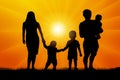 Large family at sunset silhouette vector Royalty Free Stock Photo