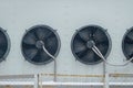 Large fans on the wall of the building