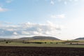 Large farmland hills green blue sky cloudy autumn agriculture farm land landscape clean sharp rural scene