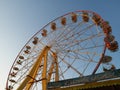 A large Ferris wheel on a blue sky background Royalty Free Stock Photo