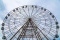 a large Ferris wheel on a blue sky background Royalty Free Stock Photo