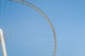 Large Ferris wheel close-up view with blue sky background in Dubai, United Arab Emirates. Royalty Free Stock Photo