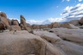 Large field of boulders along the Arch Rock trail in Joshua Tree National Park, during the late afternoon Royalty Free Stock Photo