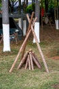 A large firewood campfire built for outdoor camping