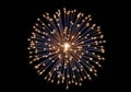 A large firework explodes against a Royalty Free Stock Photo