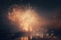 a large fireworks display in the night sky over a body of water with buildings in the background and lights reflecting off of the