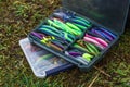 A large fisherman`s tackle box fully stocked with lures and gear for fishing.fishing lures and accessories in the box background Royalty Free Stock Photo