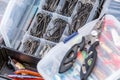 A large fisherman`s tackle box fully stocked with lures and gear for fishing.fishing lures and accessories in the box background Royalty Free Stock Photo