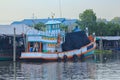 A large fishing boat docked in the water. Royalty Free Stock Photo