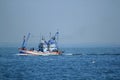 Large fishing boats in the sea.