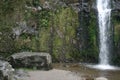 Large flat boulder near Cascada Taxopamba waterfall Otavalo Ecuador