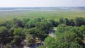 Large floodplain flat area of land next to Pascagoula River stream in Lower Mississippi near Jackson County Rest Area West in Royalty Free Stock Photo