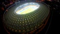 Large football stadium with creative design, night cityscape, view from above Royalty Free Stock Photo