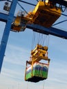 Large forklift stacking containers in port Royalty Free Stock Photo