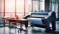 Large format color printing plotter in operation. Royalty Free Stock Photo