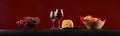Large-format panorama with red and white wine, cheese and grapes