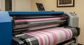 Large Format Printer Printing Pink and White Striped Paper in an Office Setting industrial Royalty Free Stock Photo