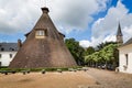 Large former conical glass making kiln and canons in Chateau Verrerie, Le Creusot, France