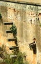 Large stone wall and fort battlements with trench landscape Royalty Free Stock Photo