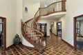 Large foyer with circular staircase