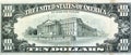 Large fragment of the reverse side of old 10 $ ten American dollars bill banknote series 1988 features the U.S. Treasury Building