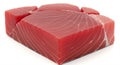 A large, fresh, raw tuna steak with a deep red color is cut into a rectangular block.
