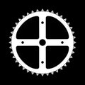 Large Front Bicycle Cog Over A Black Background