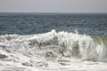 Large frothy wave crashing in the ocean Royalty Free Stock Photo