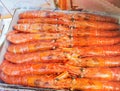 Large frozen langoustines in a package on the counter of a fish market, close-up Royalty Free Stock Photo