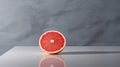 Minimalist Grapefruit Composition On Gray Background