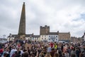 A large gathering of protesters kneel around the Obelisk at a Black Lives Matter protest in Richmond, North Yorkshire, with