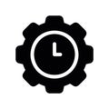 Large Gear with an Inner Clock Face Glyph Icon Royalty Free Stock Photo