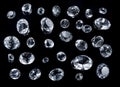 Large gemstones and small gemstones isolated on black background