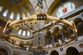 Large gilded chandelier with icons in St. Nicholas Cathedral in Kronstadt, Russia, built in 1913