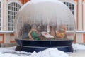 Russia, St. Petersburg, January 2022. Christmas nativity scene in a glass ball in the Alexander Nevsky Lavra.