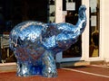 glass elephant decoration piece covered with small mirror pieces in front of antique store Royalty Free Stock Photo