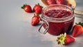 large glass with homemade strawberry jam