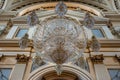 Large glass lamp hanging from the ceiling of the huge cathedral basilica del Pilar, Zaragoza. Royalty Free Stock Photo