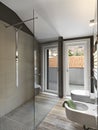 Large glass shower cubicle in a modern bahtroom