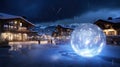 Large glowing ball at winter ski resort. Snow-capped mountain peaks. Cozy hotel, night lighting.