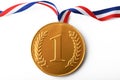 Large gold first prize medal with ribbon Royalty Free Stock Photo