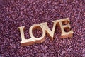 Large gold sign spelling word love