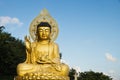 Large golden Buddha statue at Sanbanggulsa temple, Sanbang-ro, Jeju Island, South Korea