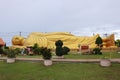 A large golden reclining Buddha in a temple in Songkhla, Thailand. Royalty Free Stock Photo