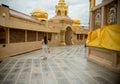 Large golden temple with sky background, Name is Phra Maha Chedi Srivang Chai, Located in Lamphun, Thailand.