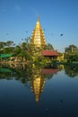 A large golden yellow pagoda at Wat Tha It In Ang Thong Province in Thailand