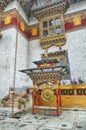 - Large gong and prayer wheels Royalty Free Stock Photo